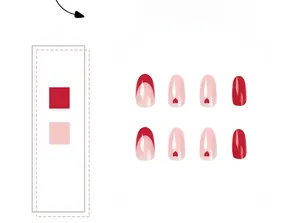 Detail of almond-shaped press-on nails featuring red French tips and heart patterns