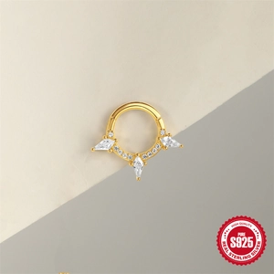 Golden S925 sterling silver nose ring with clear cubic zirconia on a minimalist background