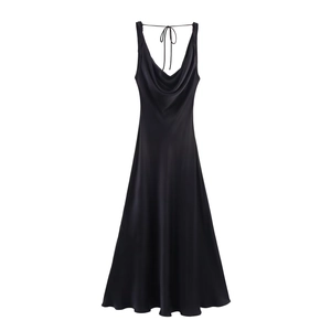 Elegant black satin slip dress with open back and tie-up detail for summer fashion
