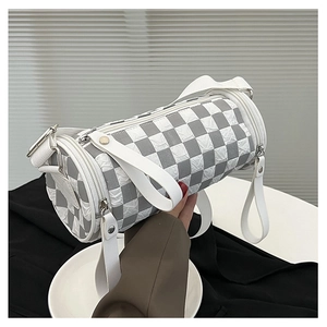 Close-up of checkered cylinder bag with pleated texture and silver metal hardware