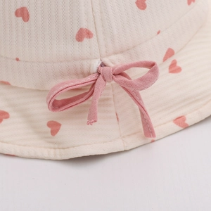 Chapeau de soleil bébé fille avec motifs cœurs roses et nœud élégant en coton