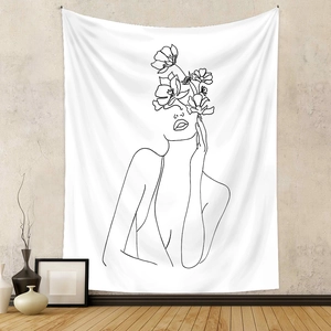 Detailed close-up of a minimalist line art wall tapestry featuring female and floral motifs