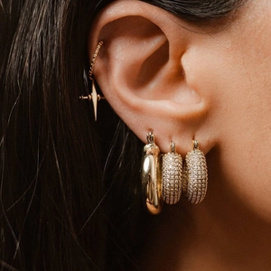 18k gold plated stainless steel hoop earrings with cubic zirconia worn by model