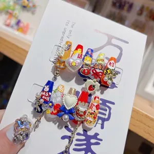 3D embossed press-on nails with cartoon characters and pearls in vibrant colors