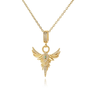 Detail of 18K gold-plated wing pendant with green gemstone and sparkling zircons