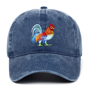 Washed blue denim baseball cap featuring detailed colorful rooster embroidery on the front