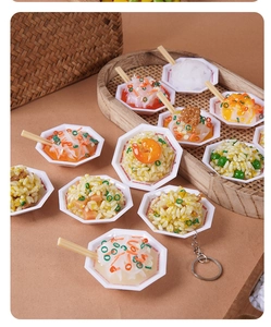 Miniature food keychains featuring fried rice and noodles in octagonal bowls with chopsticks