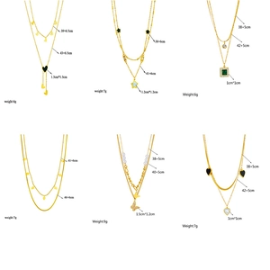 Multi-layer gold necklaces with heart, star, and pearl pendants in various designs
