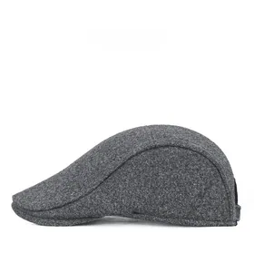 Side view of dark gray woolen ivy cap showing texture and sleek profile