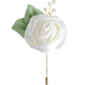 Elegant white satin rose boutonniere with gold pin and pearl accents for weddings
