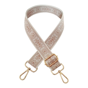 Close-up of 3.8cm wide ethnic jacquard strap with golden lobster clasps and floral pattern