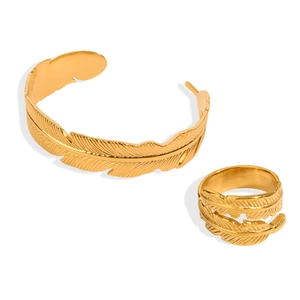 Gold feather cuff bracelet and wrap ring set with brushed metal texture for women