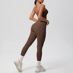 Detail view of chocolate brown yoga jumpsuit with skinny straps and racerback design