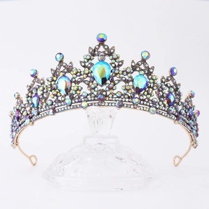 Detailed macro view of vintage bronze crown with AB crystal rhinestones and pear diamonds