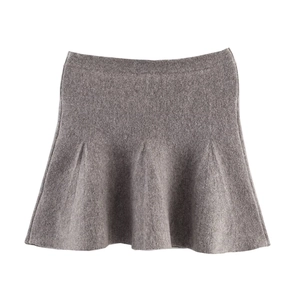 Detailed view of high-density knit brown-grey mini skirt with thick wool texture