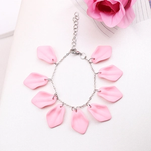 Detail of bohemian pink petal charms on silver chain with lobster clasp and extender