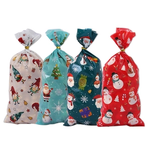 Christmas OPP gift bags featuring Santa, snowman, and reindeer festive patterns