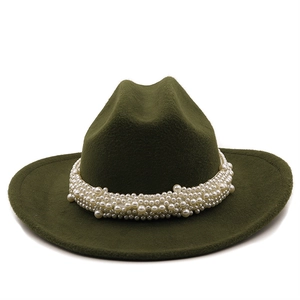 Detail of olive green wool fedora hat featuring a luxury white pearl beaded band accessory