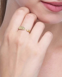 Detail of 18K gold stainless steel open ring with pavé diamonds on woman finger
