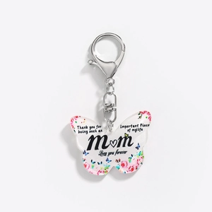 Detail of butterfly acrylic keychain with pink floral pattern and Mom love you forever text
