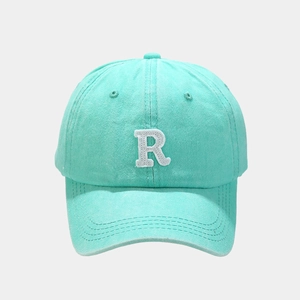Front detail of mint green vintage baseball cap with white 3D letter R embroidery
