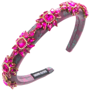 Detail of purple jacquard padded headband with pink crystal floral clusters and handmade label