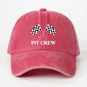 Close-up of washed cotton racing baseball cap with Pit Crew print and checkered flags