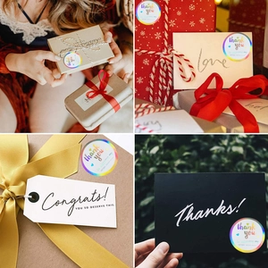 Roll of 500 holographic rainbow thank you stickers for small business packaging