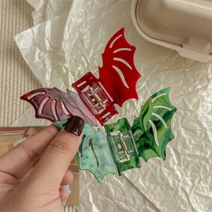 Gothic bat hair claws in red and green acetate finish for Halloween y2k style