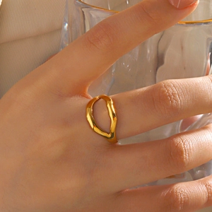 Polished 18K gold plated stainless steel lip ring with minimalist open design for women