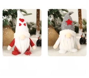 Detail of Christmas gnomes ornaments featuring felt hats with red heart and star decorations