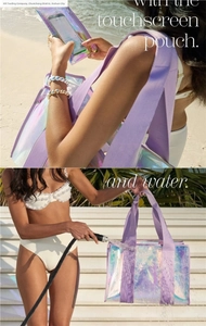 Waterproof holographic laser PVC tote bag being rinsed with water to show durability