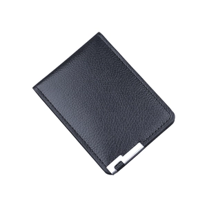 Slim black lychee leather card holder for men with silver metal bar detail on white background
