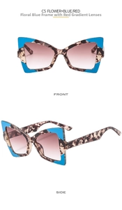 Detail view of butterfly sunglasses with floral blue tortoiseshell frame and gradient red lenses