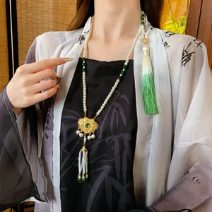 Chinese style pearl necklace with green tassels and golden Ruyi phoenix pendant