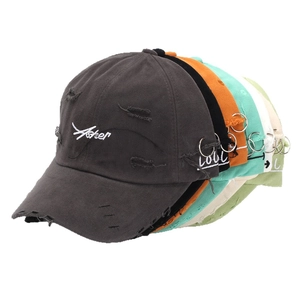 Distressed baseball caps with Asher embroidery and metal ring details in various colors