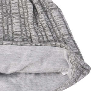 Grey vertical ribbed knit beanie for men and women, soft warm outdoor winter hat.