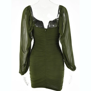 Back view of army green mesh mini dress showing ruched details and zipper closure