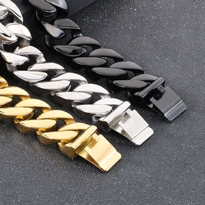 Detailed close-up of 22mm thick polished Cuban link bracelets in gold, silver, and black