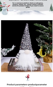 Detail of Christmas gnome with gray sequin hat and white faux fur beard on book