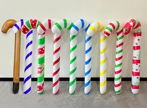 Detailed view of nine colorful PVC inflatable candy canes with various festive patterns