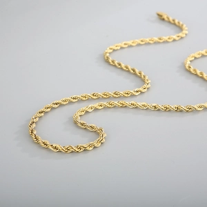 Detail view of 18k gold plated stainless steel rope chain with twisted link texture