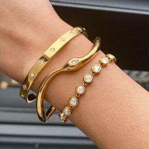 Gold stainless steel snake bracelet and star zircon jewelry set for women worn on wrist