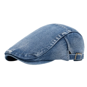 Classic washed denim newsboy cap with vintage distressed finish and metal side buckle