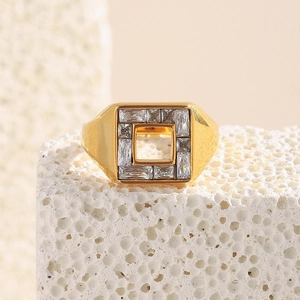 Detail of 18K gold plated square geometric ring with sparkling inset zircons on stone