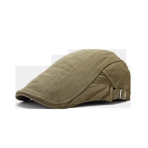 Detail view of military green twill fabric and adjustable metal side buckle on ivy cap