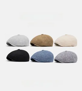 Matrix display of six colored linen newsboy caps in flat lay style for men and women
