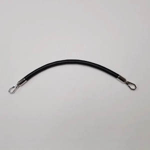 Detail of black leather handbag strap with polished silver metal swivel lobster hooks
