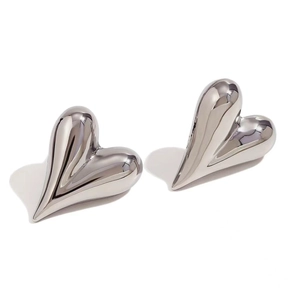 Detailed view of 3D puffy heart stud earrings with silver mirror polished surface