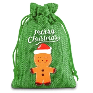 Close-up of green burlap Christmas drawstring bag with a cute gingerbread man icon